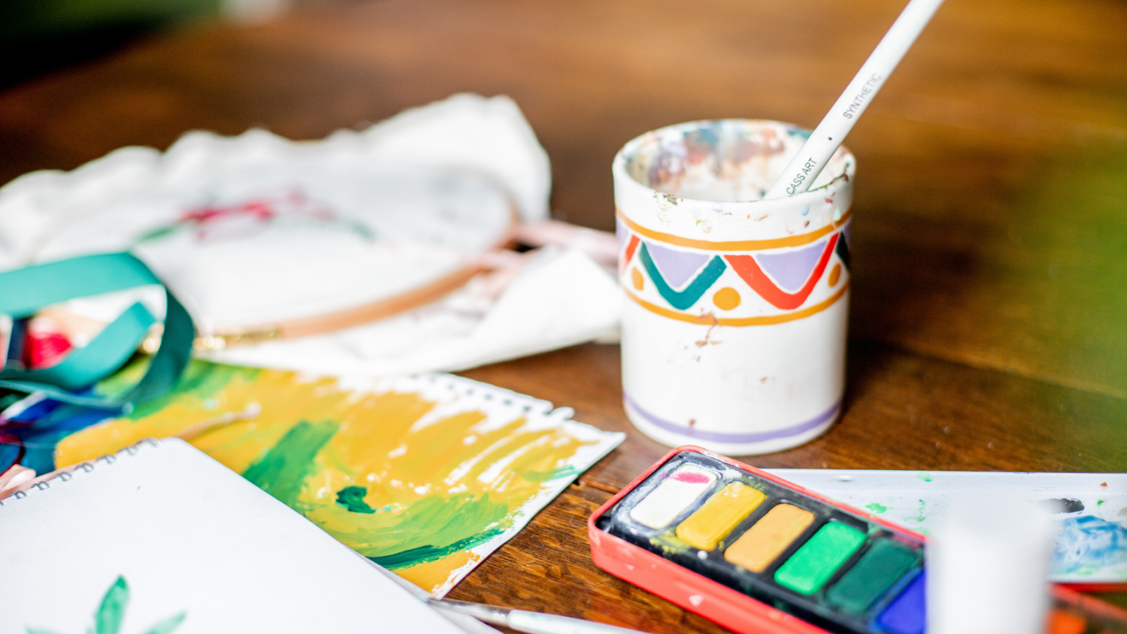 Watercolour paint pot, paintings and water pot