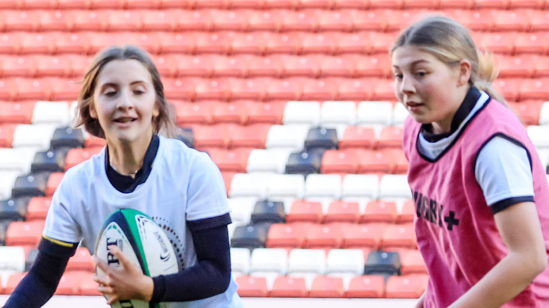 Young Girls Playing Rugby Aspect Ratio 1600 900